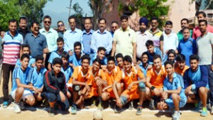Players posing alongwith dignitaries during inaugural ceremony of Handball Championship at Udhampur.