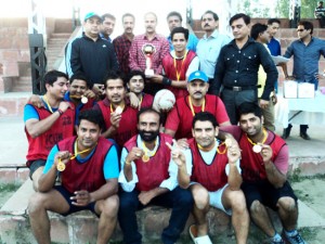 Winners of Handball Championship posing alongwith dignitaries in Kathua on Saturday.  