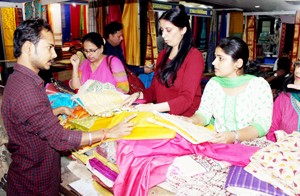 Visitors having glimpse of products during ‘Silk India-2015’ Expo at Jhelum Resort on Saturday.