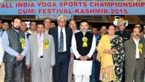 Governor N N Vohra and other dignitaries posing for a group photograph during Inaugural ceremony of Yoga Sports Championship in Srinagar on Saturday.