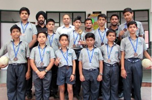 Under-14 Handball team of Heritage School posing for a group photograph alongwith dignitaries on Thursday.