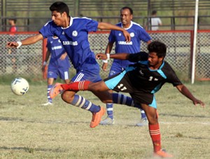 Footballers making every effort to get hold of the ball during a match of the Senior Division Football League Tournament in Jammu on Thursday. —Excelsior/Rakesh