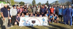 Winners of football match posing alongwith dignitaries in Poonch on Wednesday.