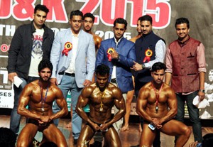 Players displaying their muscles during Mr J&K 2015 Body Building Championship in Jammu on Sunday.    —Excelsior/Rakesh