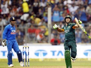 South Africa's Faf du Plessis celebrates his century during their fifth and final One-Day International cricket match against India in Mumbai on Sunday. (UNI)