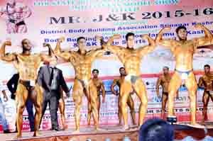 Body builders during 11th Mr Body Building and Fitness Championship at Bakshi Stadium, Srinagar.