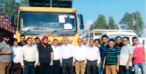 Officials of Mahindra posing for photograph after inaugurating service centre at Udhampur.