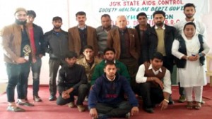 Winners of symposium posing for group photograph on Wednesday.