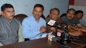R K Kalsotra addressing a press conference at Jammu on Friday. —Excelsior/Rakesh