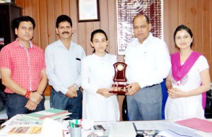 Atika Sharma alongwith dignitaries during felicitation function at GDC Kathua on Friday.