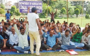 Members of Agriculture Casual Labour Union raising slogans in support of their demands on Thursday.