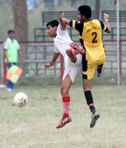 Players in action during football match at GGM Science College Ground on Tuesday.       —Excelsior/Rakesh