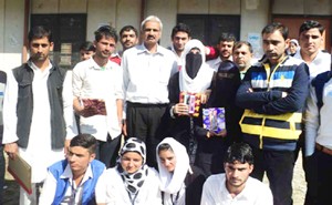 Winners of Quiz Competition Posing for a group photograph alongwith dignitaries at GDC Banihal.  