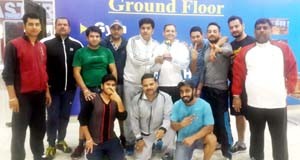 Winners of cricket match posing for a photograph at KCSC in Jammu on Friday. 