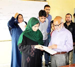 Minister for Education, Naeem Akhtar during his visit to an educational institution of Sopore.