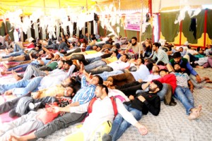 Members of All J&K National Youth Corps (NYC) observing hunger strike in Srinagar on Wednesday.-Excelsior/Amin War
