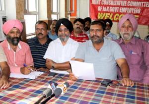 Senior JCC member Ganesh Khajuria addressing press conference in Jammu on Tuesday. —Excelsior/Rakesh