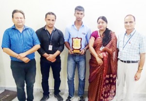 Shubham Dogra posing alongwith dignitaries at Yogananda College of Engineering & Technology in Jammu.