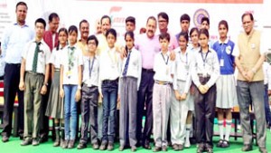 Union Minister Dr Jitendra Singh, along with social activist and ideologue Indresh Kumar, posing for photograph with student representatives of different schools on the eve of "World Students' Day" to mark the birth anniversary of former President, Late Dr APJ Abdul Kalam at New Delhi on Wednesday.