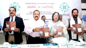 Union Minister Dr Jitendra Singh flanked by Union Ministers Dr Najma Heptulla, Mukhtar Abbas Naqvi and Union Secretary Arvind Mayaram, releasing coffee table book on traditional arts and crafts at "Jashn-e-Usttad" organized by Ministry of Minority Affairs at New Delhi on Monday.