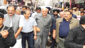 NC leader Dr Farooq Abdullah visiting Raghunath Bazar in Jammu on Tuesday. -Excelsior/ Rakesh