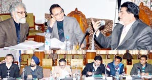 Minister for Transport, Abdul Ghani Kohli chairing 73rd BoDs meeting of SRTC at Srinagar on Monday.