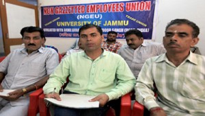 Members of JU Non-Gazetted Employees Union addressing a press conference on Campus on Monday. —Excelsior/Rakesh