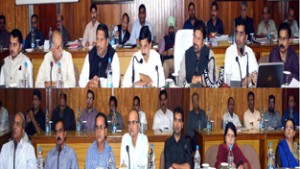 Minister for Health, Ch Lal Singh reviewing implementation of decisions of DDB in a meeting at Udhampur on Wednesday.