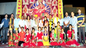 Children participants posing with guests on 6th Day of Navratra Festival.