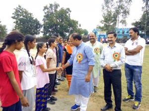 Players being introduced to chief guest before the start of Beti Bachao Girls Cricket Championship on Saturday.