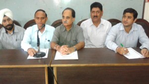 Scientists of SKUAST-J addressing a press conference at Jammu on Tuesday.