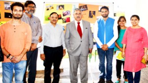Vice Chancellor Central University Jammu Prof Ashok Aima posing with students of Mass Communication on Tuesday. 