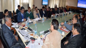 Minister for Cooperative, Chering Dorjay chairing a meeting at Srinagar on Tuesday. 