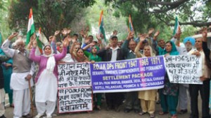 Displaced Persons from PoJK staging protest at Exhibition Ground  in Jammu on Thursday. —Excelsior/ Rakesh