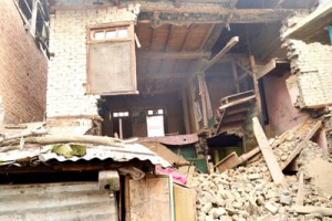 House which collapsed due to earth quake. -Excelsior/ Younis Khaliq
