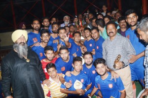 Winners of Senior Division Football League posing for a group photograph alongwith DIG Jammu on Sunday.