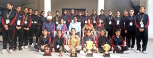 Students of JKPPS who excelled in the Women Sports Festival posing for a group photograph alongwith Principal and other dignitaries.