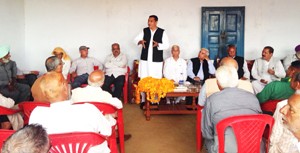Senior Cong leader, Sham Lal Sharma addressing party workers in Akhnoor on Friday.