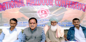 NMC president, Subhash Shastri along with others addressing a convention of workers at village Bomyal in Jammu.