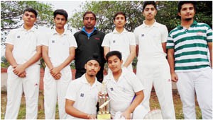 Cricketers of Jodhamal Public School posing alongwith coach after returning from Lucknow.