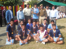 Winners of Volleyball competition organised by Army under Operation Sadhbhavna posing for a group photograph.