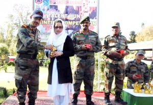 Winner of Painting competition organised by Army being felicitated on Monday.