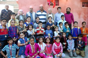 Winners of painting competition organised by Baru Biradari in Jammu on Wednesday.