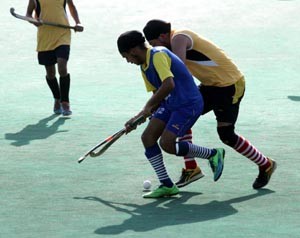 Players in action during a match of Shaheed Baba Banda Singh Bahadur Memorial Hockey Tournament in Jammu. —Excelsior/Rakesh