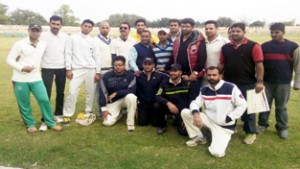 Players of Singh Cricket Club Akhnoor posing for a group photograph after clinching win over Media XI at MA Stadium on Wednesday.