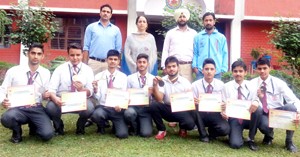 Students of Vishwa Bharti School who won medals in National Thai Boxing Championship posing for a group photograph.  