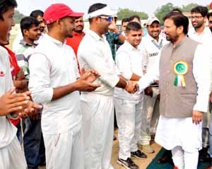 Minister for Health and Medical Education, Choudhary Lal Singh interacting with players while inaugurating All India T20 Cricket Tournament in Jammu on Tuesday.