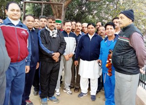 MLA, Sat Sharma with Morning Walkers Association members at Jammu on Friday.