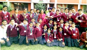 Medal winners in Thai Boxing Competition posing for group photograph.