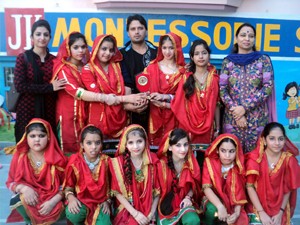 Winners of Dogri Fold Dance Competition posing for group photograph.
